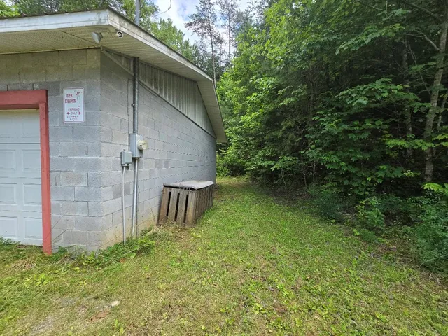 a view of a backyard of the house