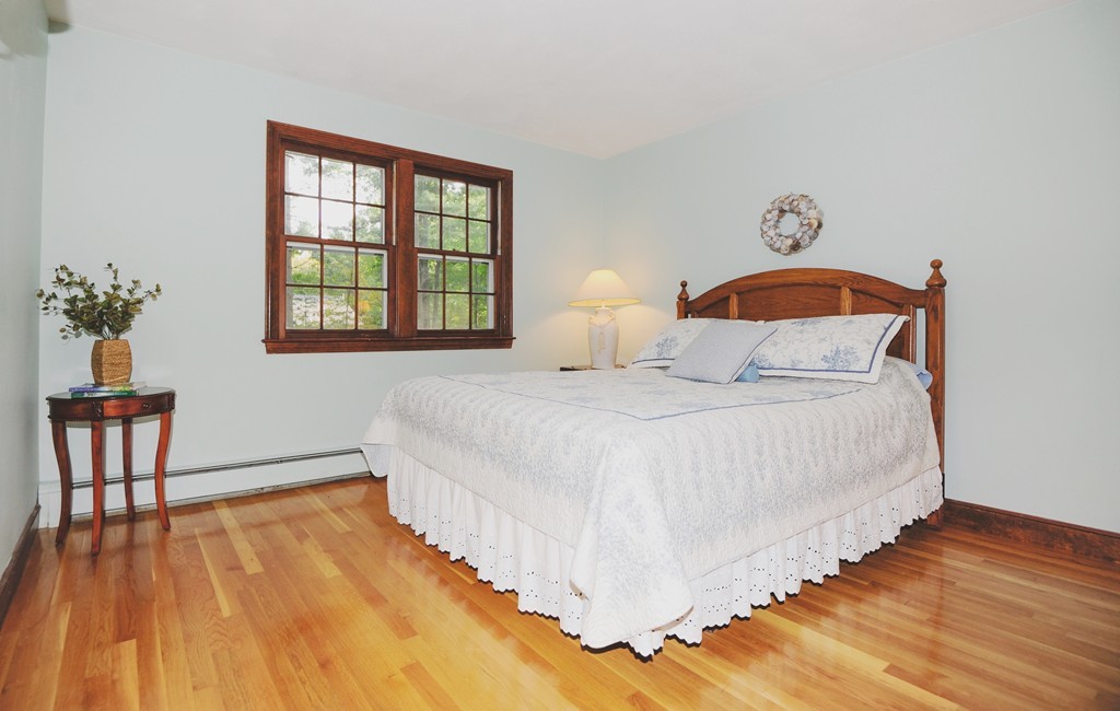 16 Olde Lantern Road Acton, MA 01720 - Photo 13 of 16 a bedroom with bed and window
