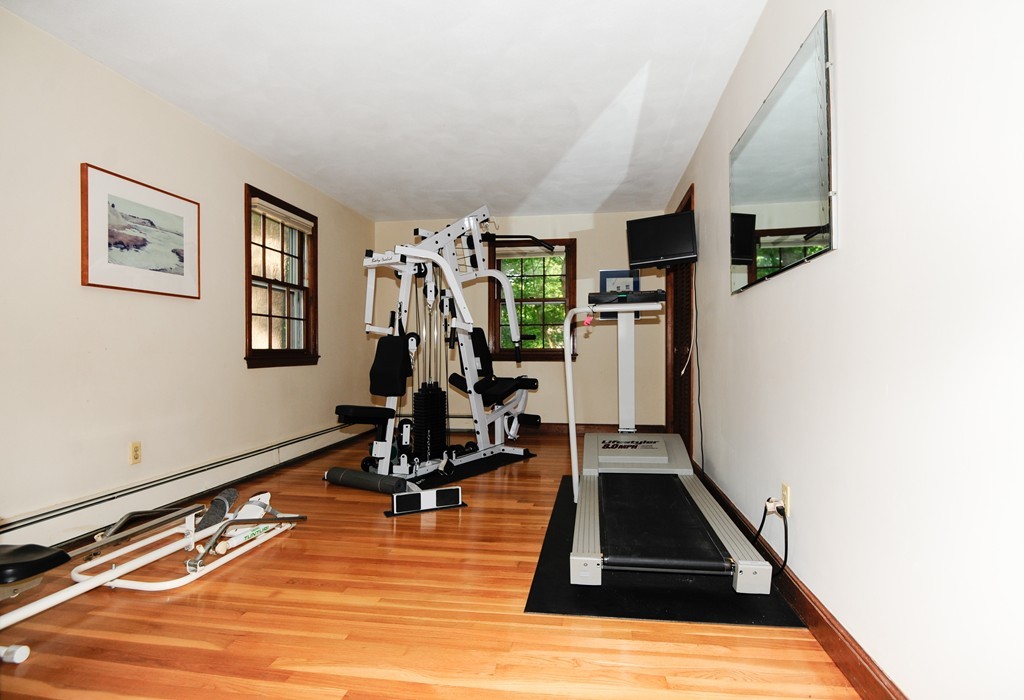 16 Olde Lantern Road Acton, MA 01720 - Photo 14 of 16 a view of a room with gym equipment