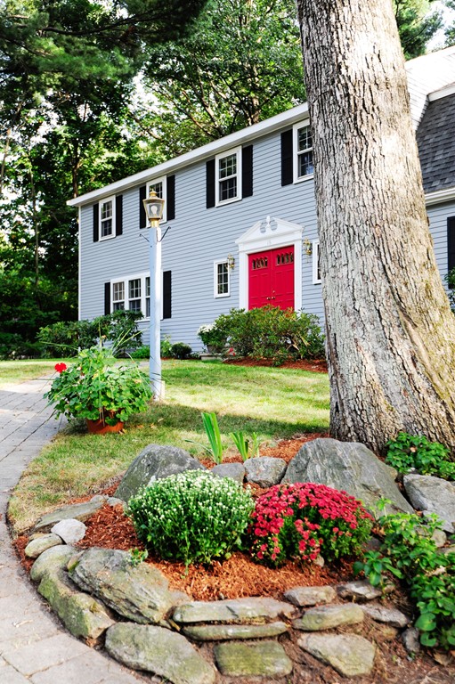 16 Olde Lantern Road Acton, MA 01720 - Photo 2 of 16 a front view of a house with a yard