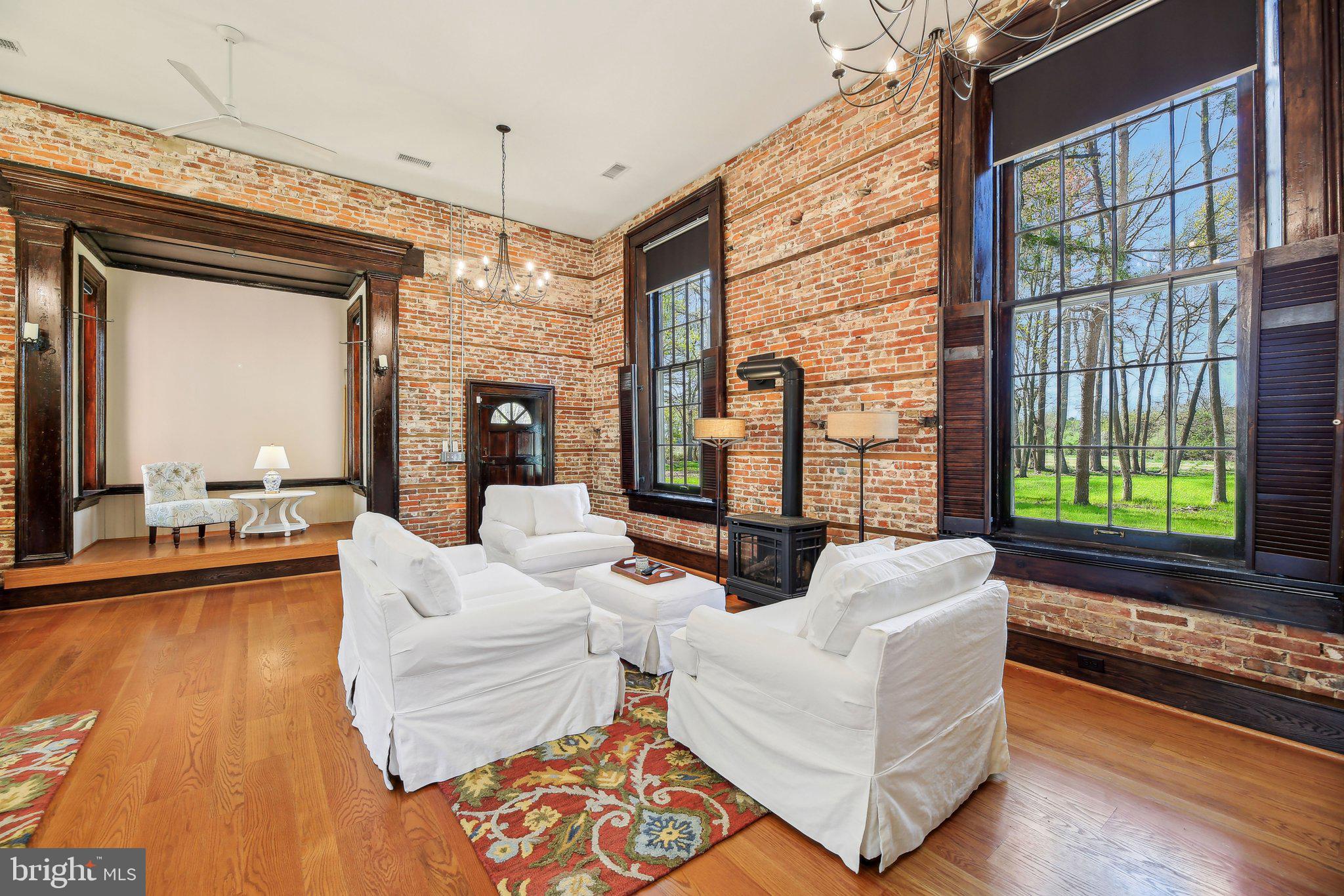 5179 Quaker Neck Road Chestertown, MD 21620 - Photo 14 of 48 a living room with furniture and a large window