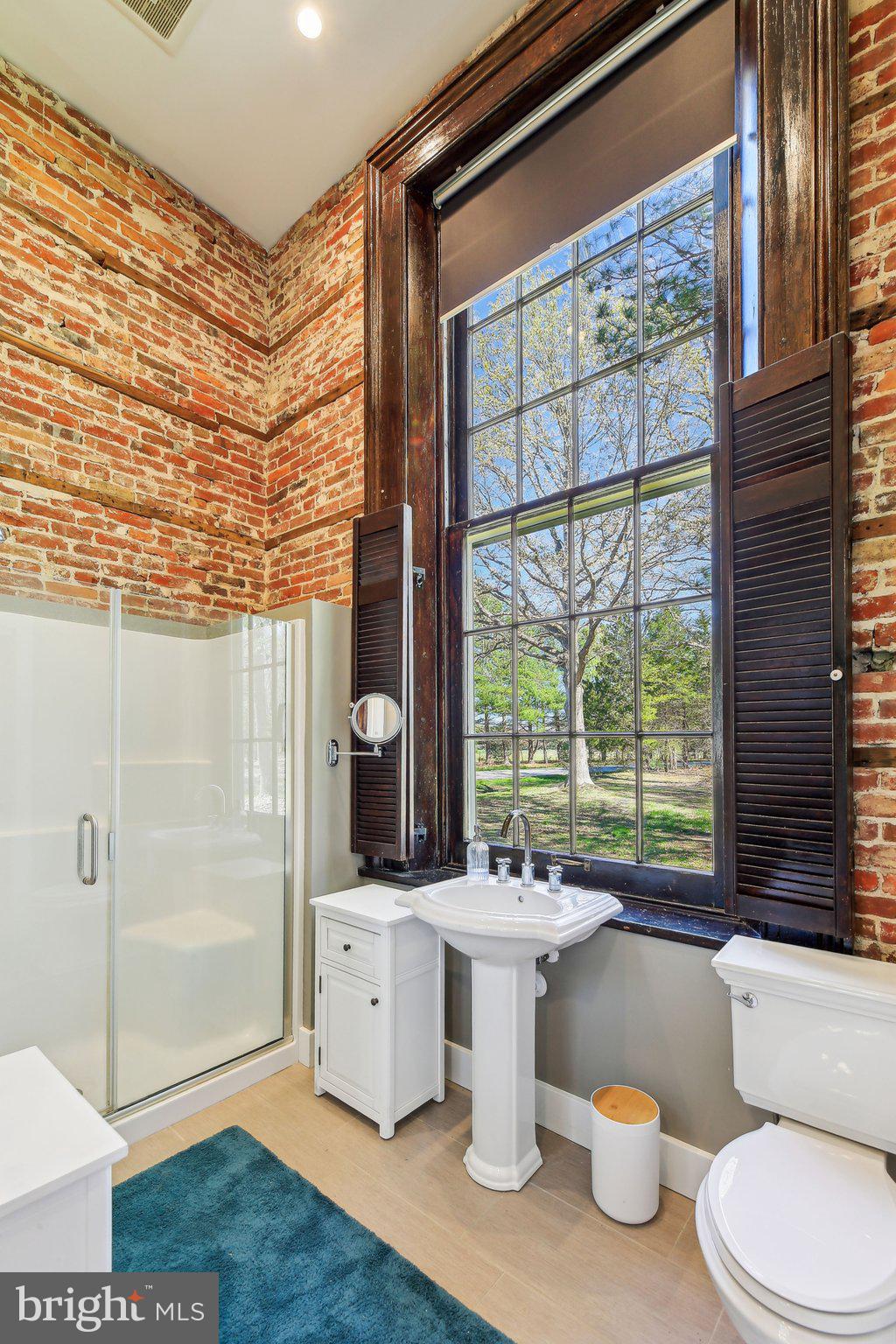 5179 Quaker Neck Road Chestertown, MD 21620 - Photo 23 of 48 a bathroom with a sink toilet and shower