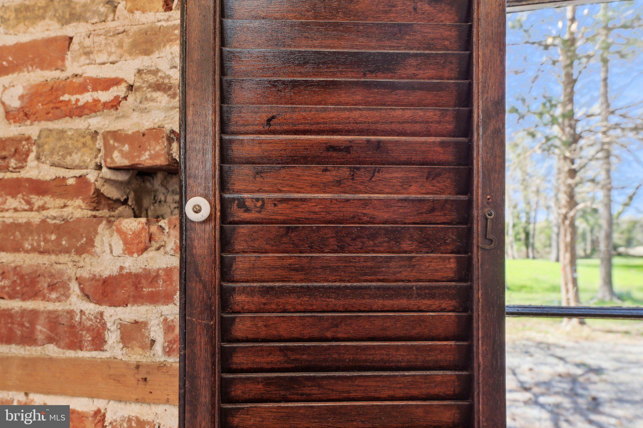 5179 Quaker Neck Road Chestertown, MD 21620 - Photo 25 of 48 a view of entryway with wooden floor and a front door