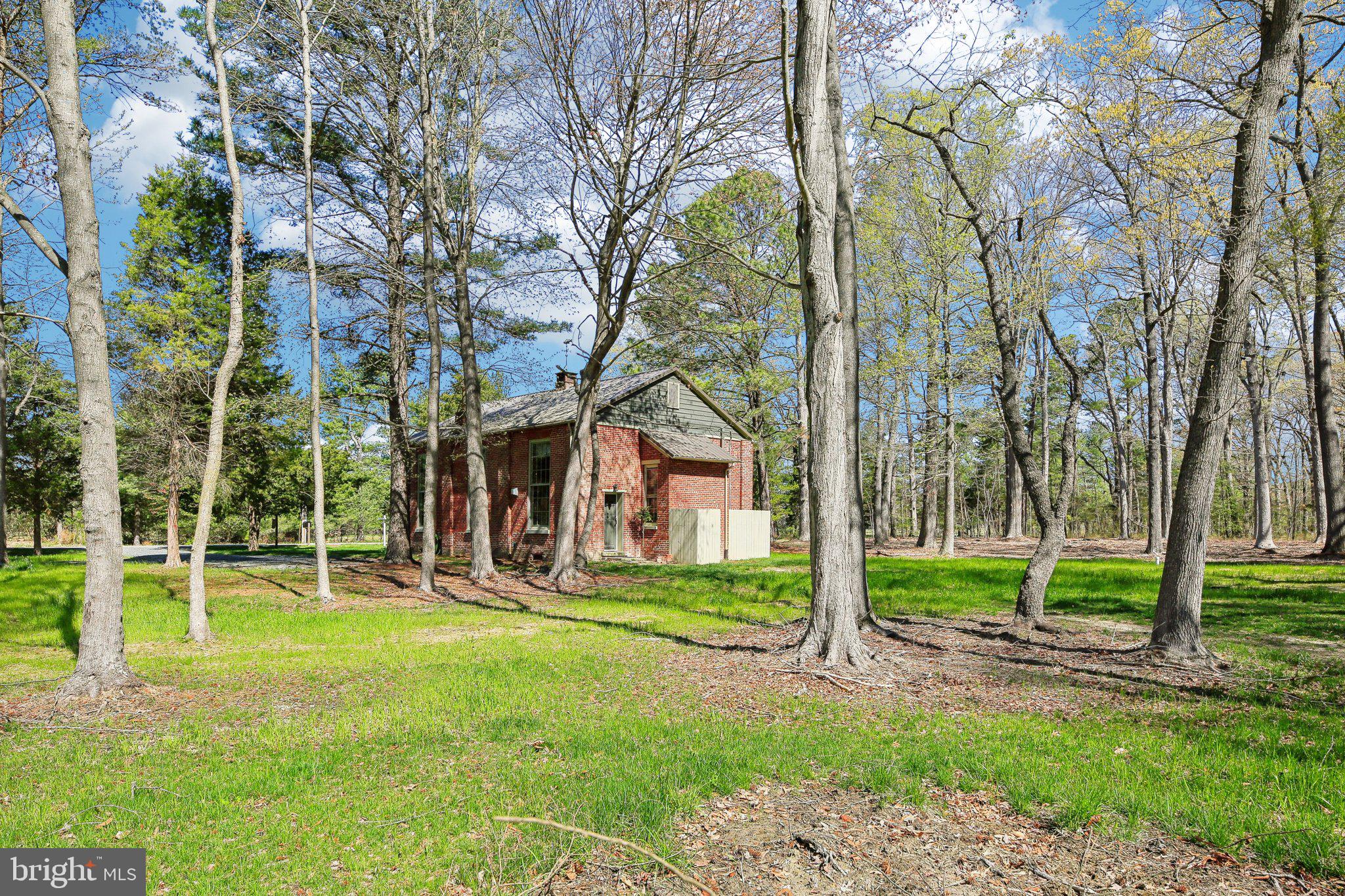 5179 Quaker Neck Road Chestertown, MD 21620 - Photo 30 of 48 a view of a house with a yard