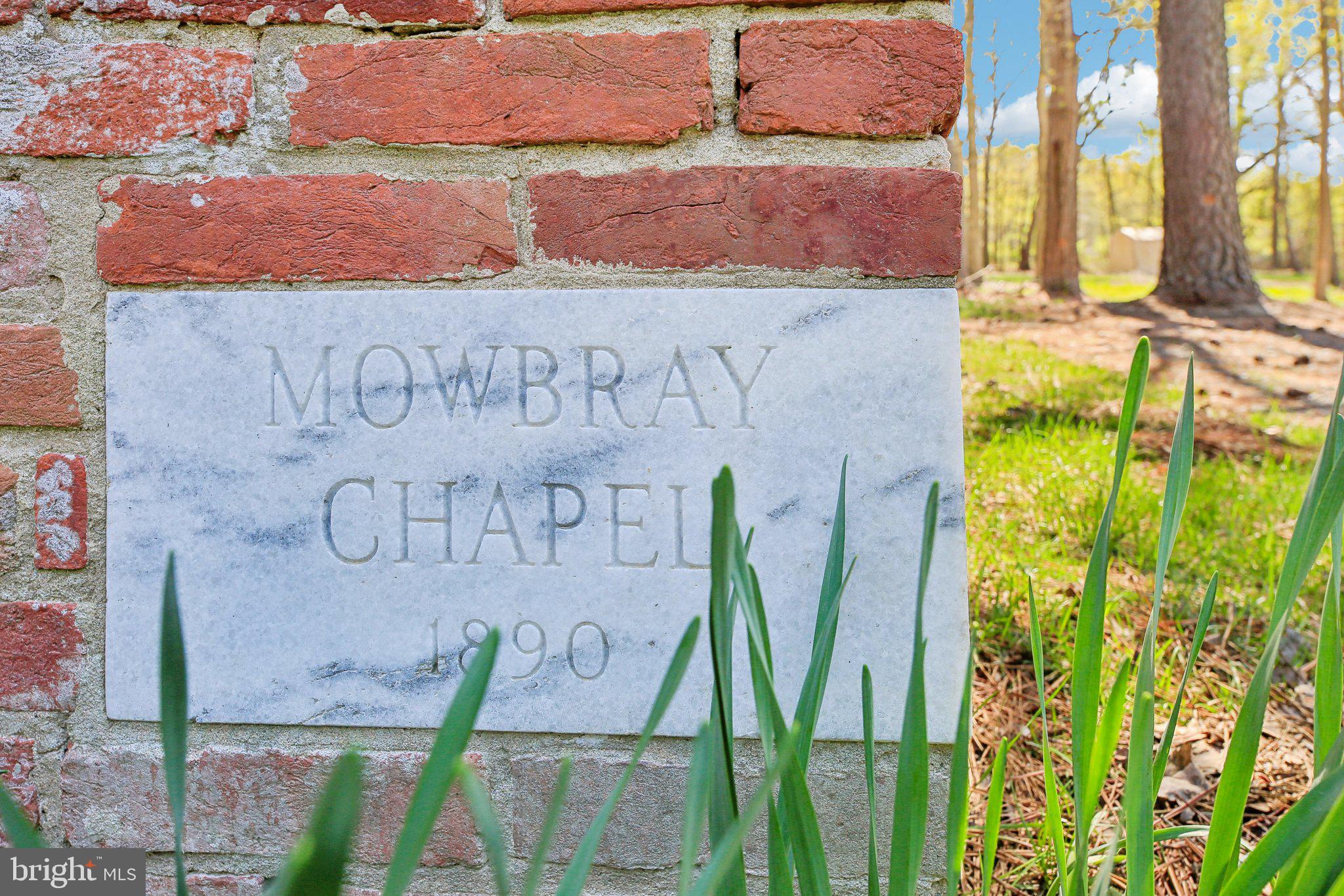 5179 Quaker Neck Road Chestertown, MD 21620 - Photo 31 of 48 a sign that is on the wall of a building