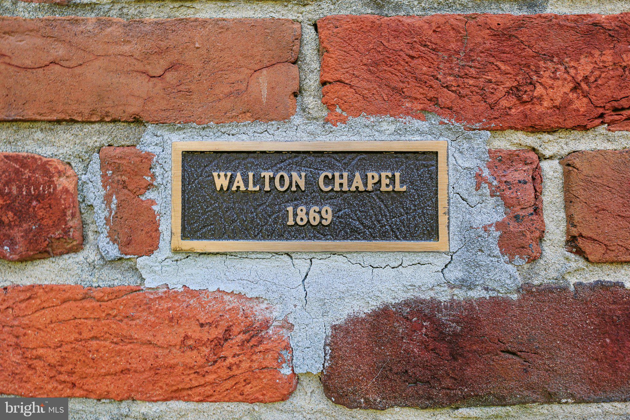 5179 Quaker Neck Road Chestertown, MD 21620 - Photo 33 of 48 a sign on the side of a building