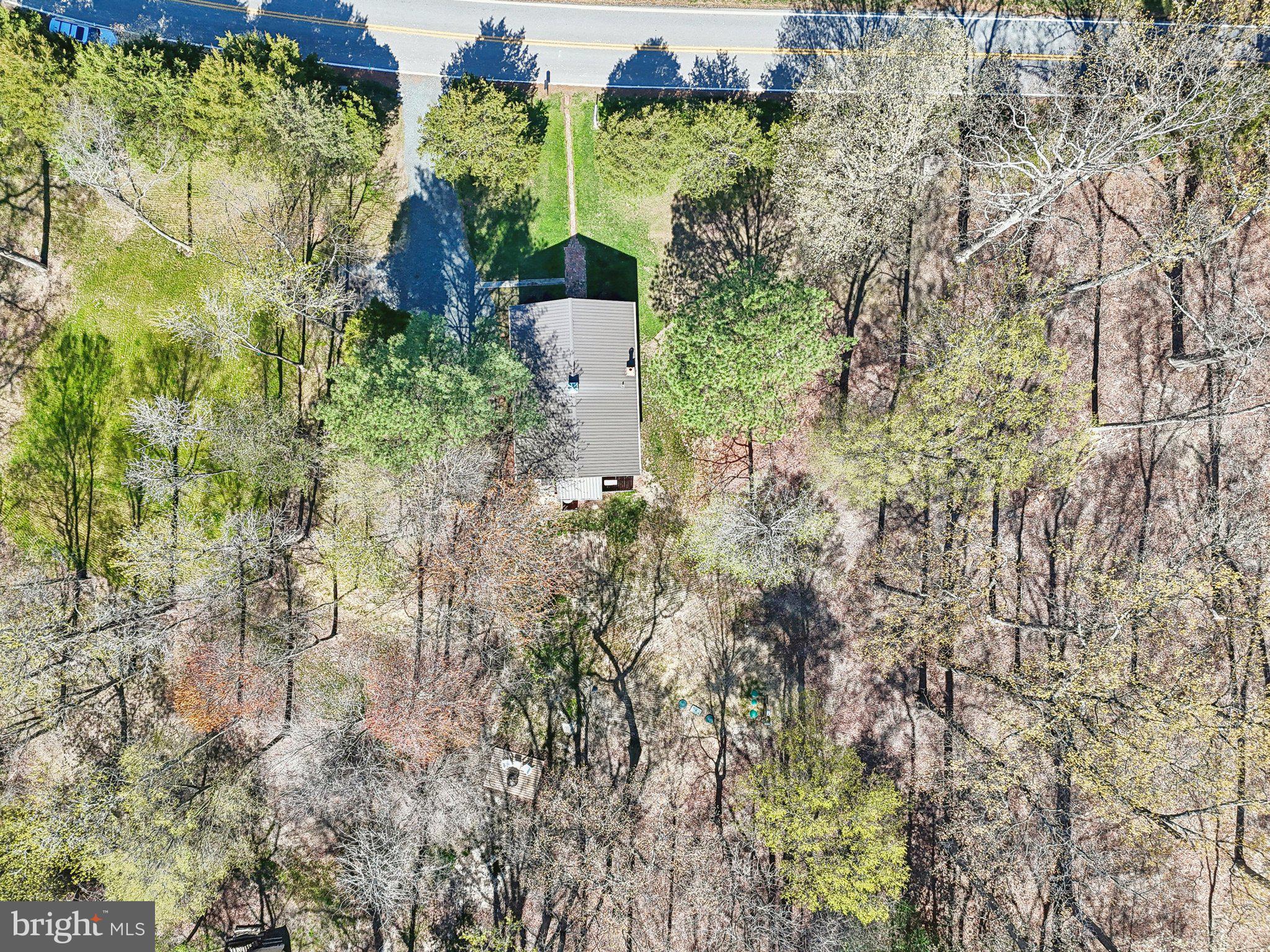 5179 Quaker Neck Road Chestertown, MD 21620 - Photo 39 of 48 a view of a garden with a building