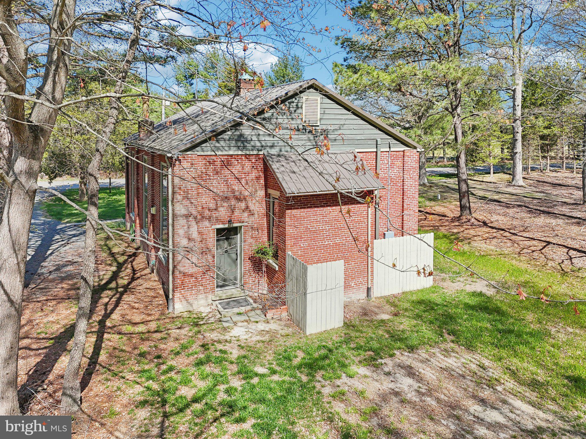 5179 Quaker Neck Road Chestertown, MD 21620 - Photo 43 of 48 a front view of a house with garden