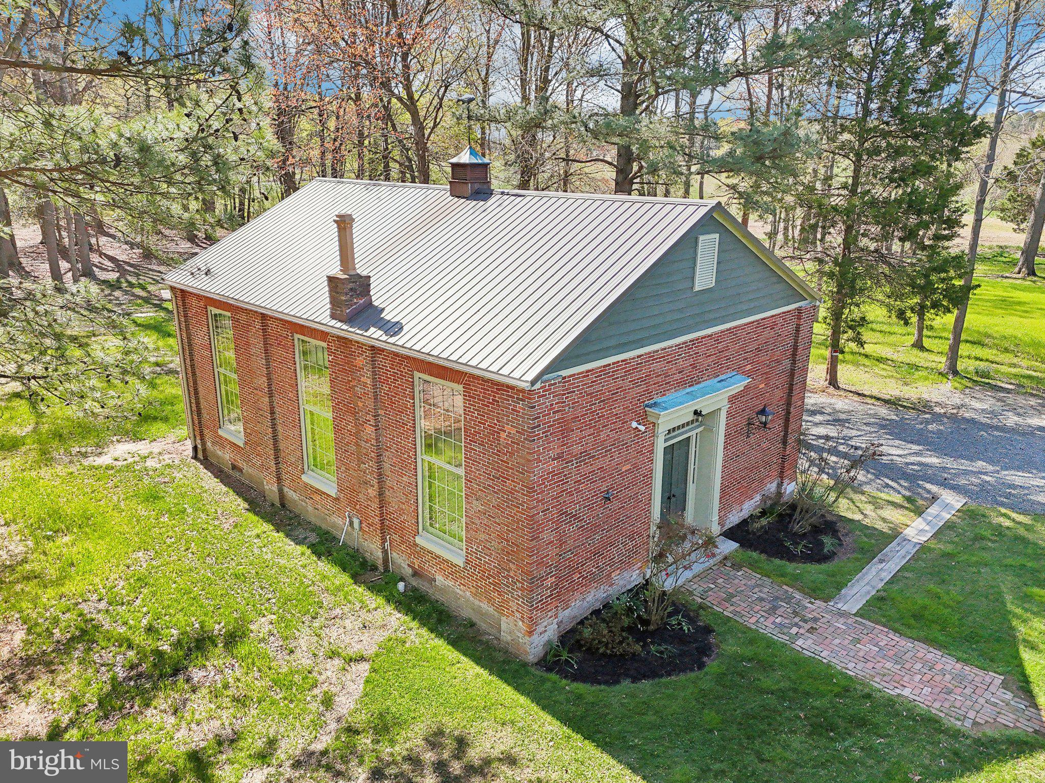 5179 Quaker Neck Road Chestertown, MD 21620 - Photo 44 of 48 a view of a house with backyard and trees