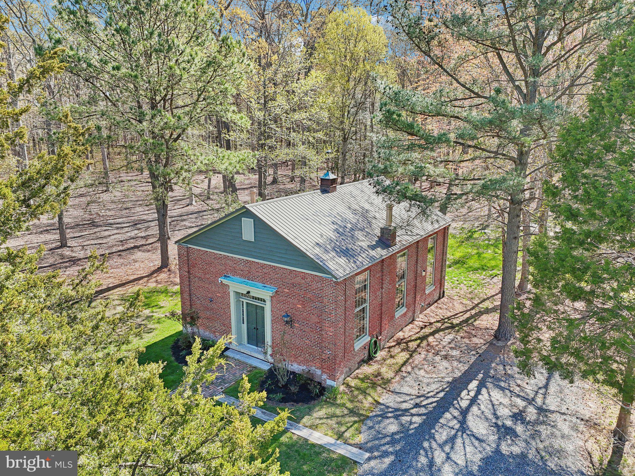 5179 Quaker Neck Road Chestertown, MD 21620 - Photo 5 of 48 front view of a house with a yard