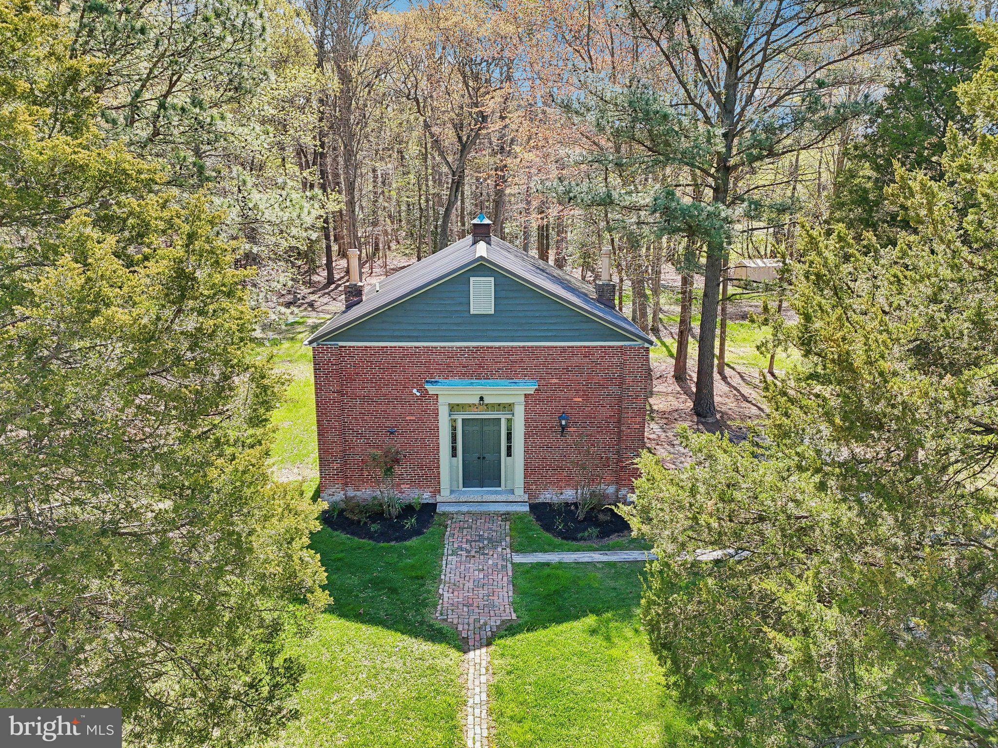 5179 Quaker Neck Road Chestertown, MD 21620 - Photo 6 of 48 a front view of a house with garden