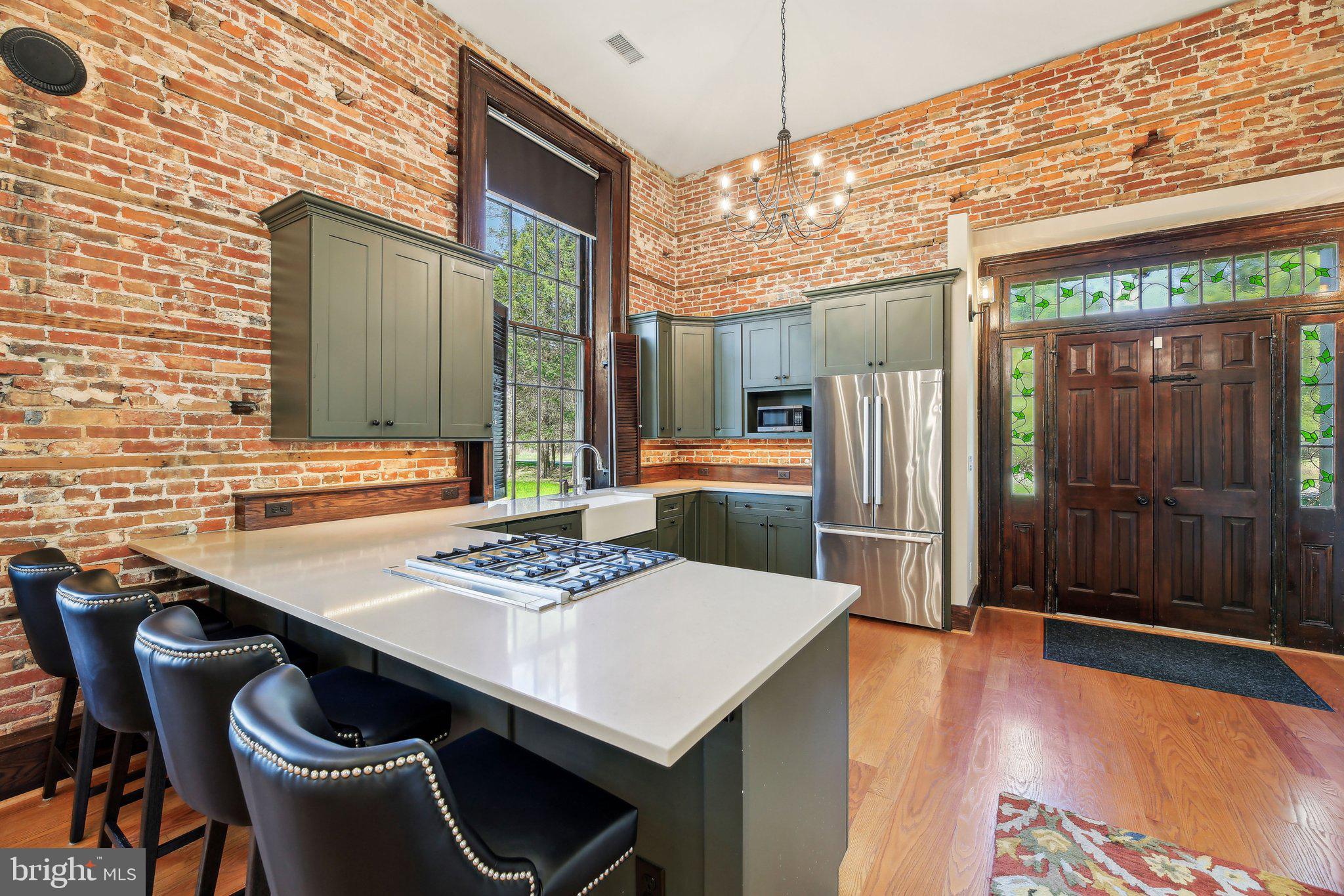 5179 Quaker Neck Road Chestertown, MD 21620 - Photo 10 of 48 a dinning table and chairs in the patio