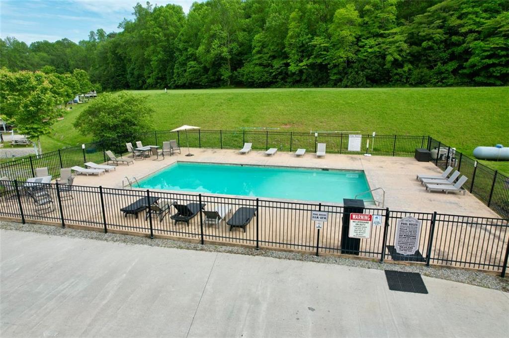 33 Mountain Meadows Circle Morganton, GA 30560 - Photo 21 of 35 a view of a swimming pool with a patio