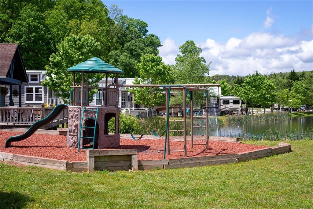33 Mountain Meadows Circle Morganton, GA 30560 - Photo 22 of 35 a garden view with a seating space and garden