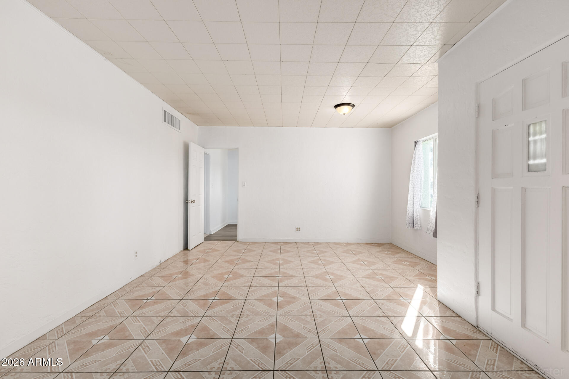 3326 West Culver Street Phoenix, AZ 85009 - Photo 11 of 18 a view of an empty room