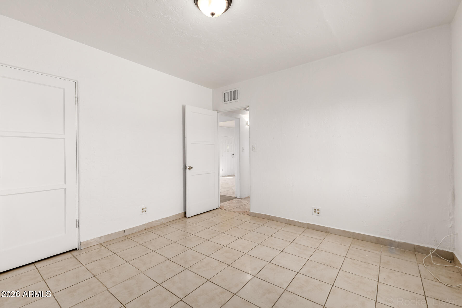 3326 West Culver Street Phoenix, AZ 85009 - Photo 13 of 18 a view of an empty room