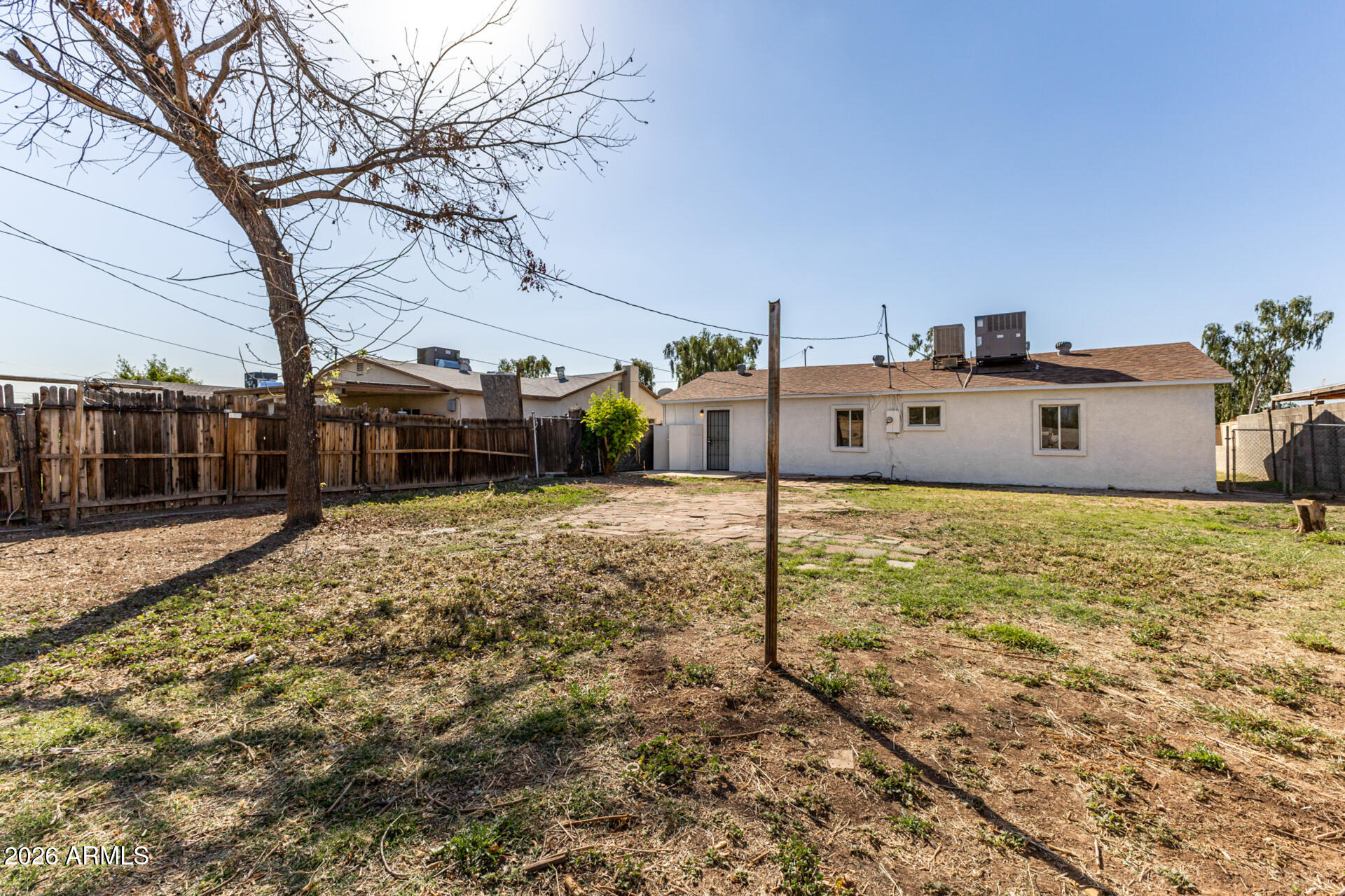 3326 West Culver Street Phoenix, AZ 85009 - Photo 18 of 18 a front view of a house with a yard