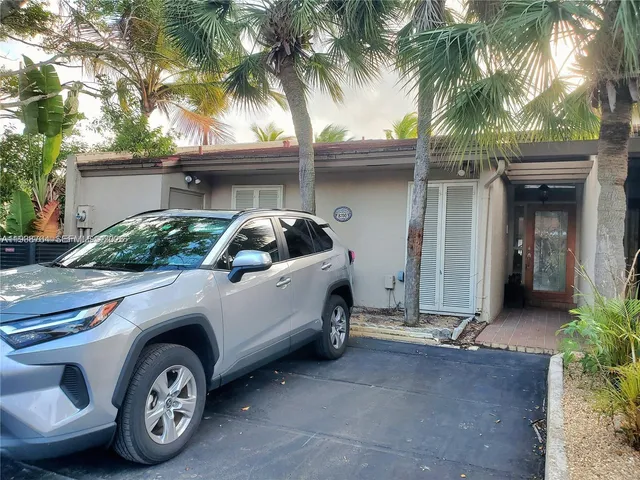 a car parked in front of a building