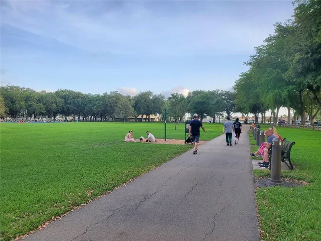 an outdoor space view with a lot of people and a couch