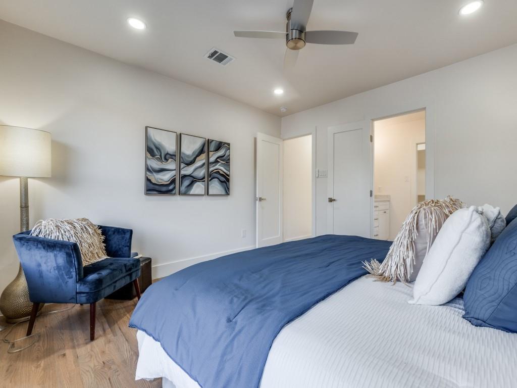 6611 Blessing Drive Dallas, TX 75214 - Photo 18 of 25 a bed room with a bed and chair