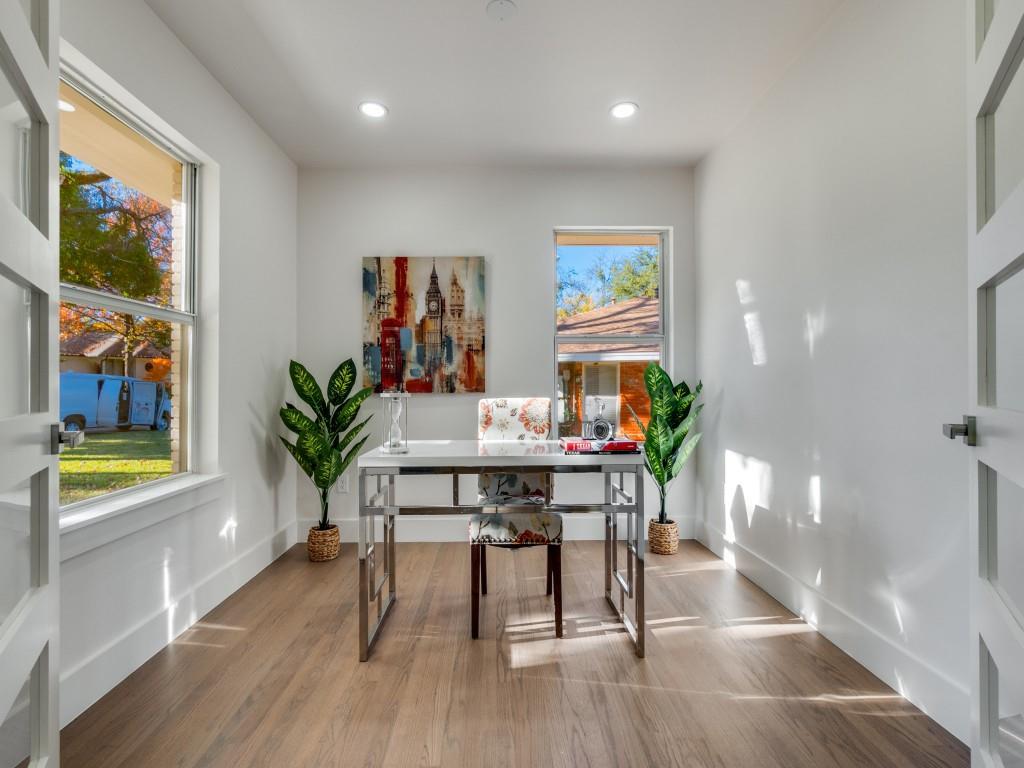 6611 Blessing Drive Dallas, TX 75214 - Photo 4 of 25 a view of a dining room with furniture one side kitchen view and wooden floor