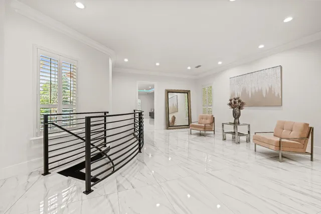 a kitchen with cabinets and stainless steel appliances