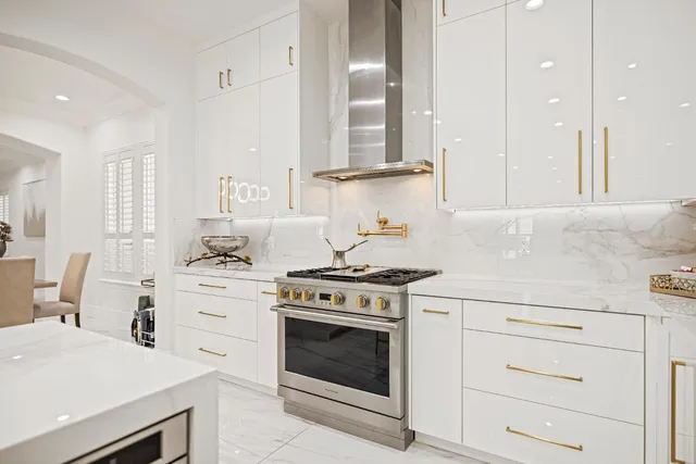 a room with a sink and a mirror