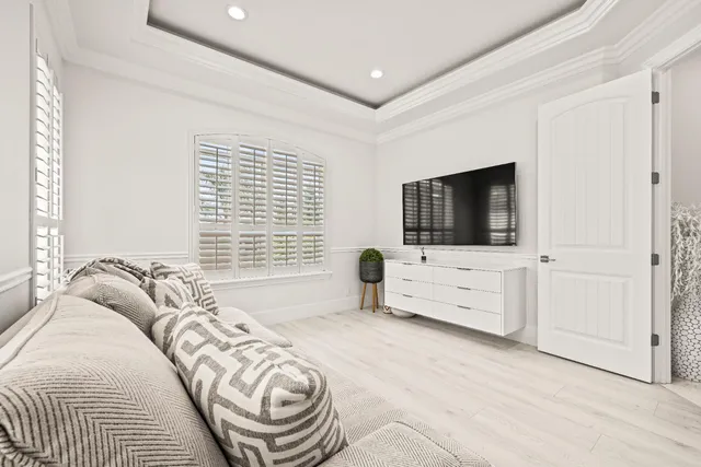 a view of a patio with table and chairs and potted plants