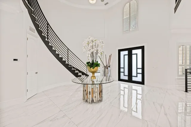 a room with furniture and flat screen tv