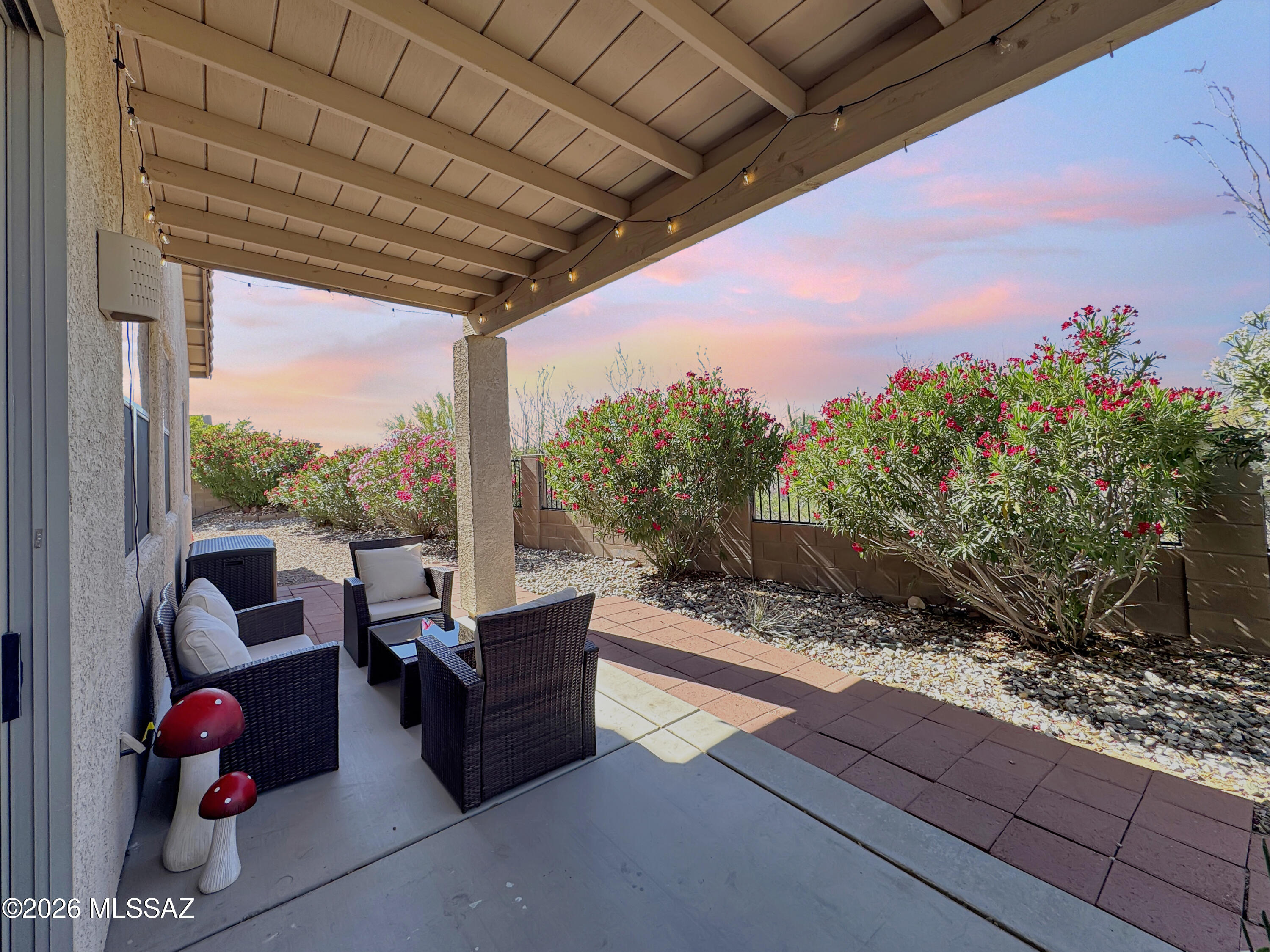 10835 South Heart Break Ridge Place Vail, AZ 85641 - Photo 40 of 49 a outdoor space with couch