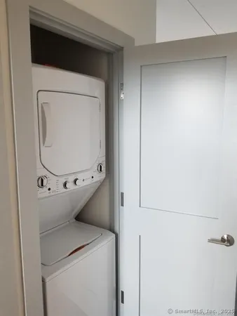 a view of a balcony with chairs