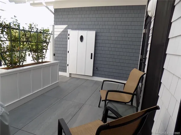 a bathroom with a shower and mirror