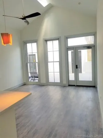 an empty room with windows