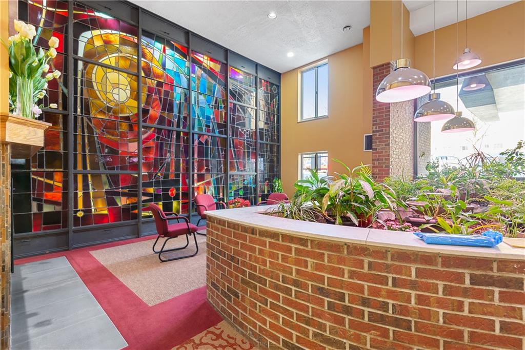 5 Bayard Road, Unit 308 Pittsburgh, PA 15213 - Photo 3 of 25 a building outdoor space with lots of potted plants