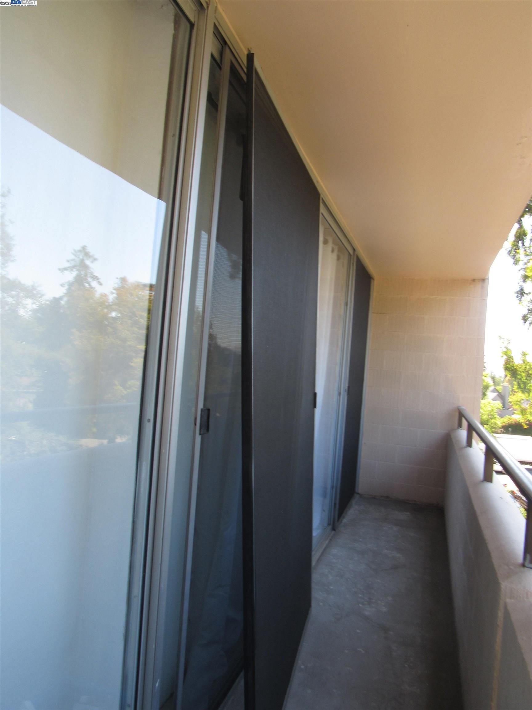 3909 Stevenson Boulevard, Unit 402 Fremont, CA 94538 - Photo 17 of 32 a view of a hallway