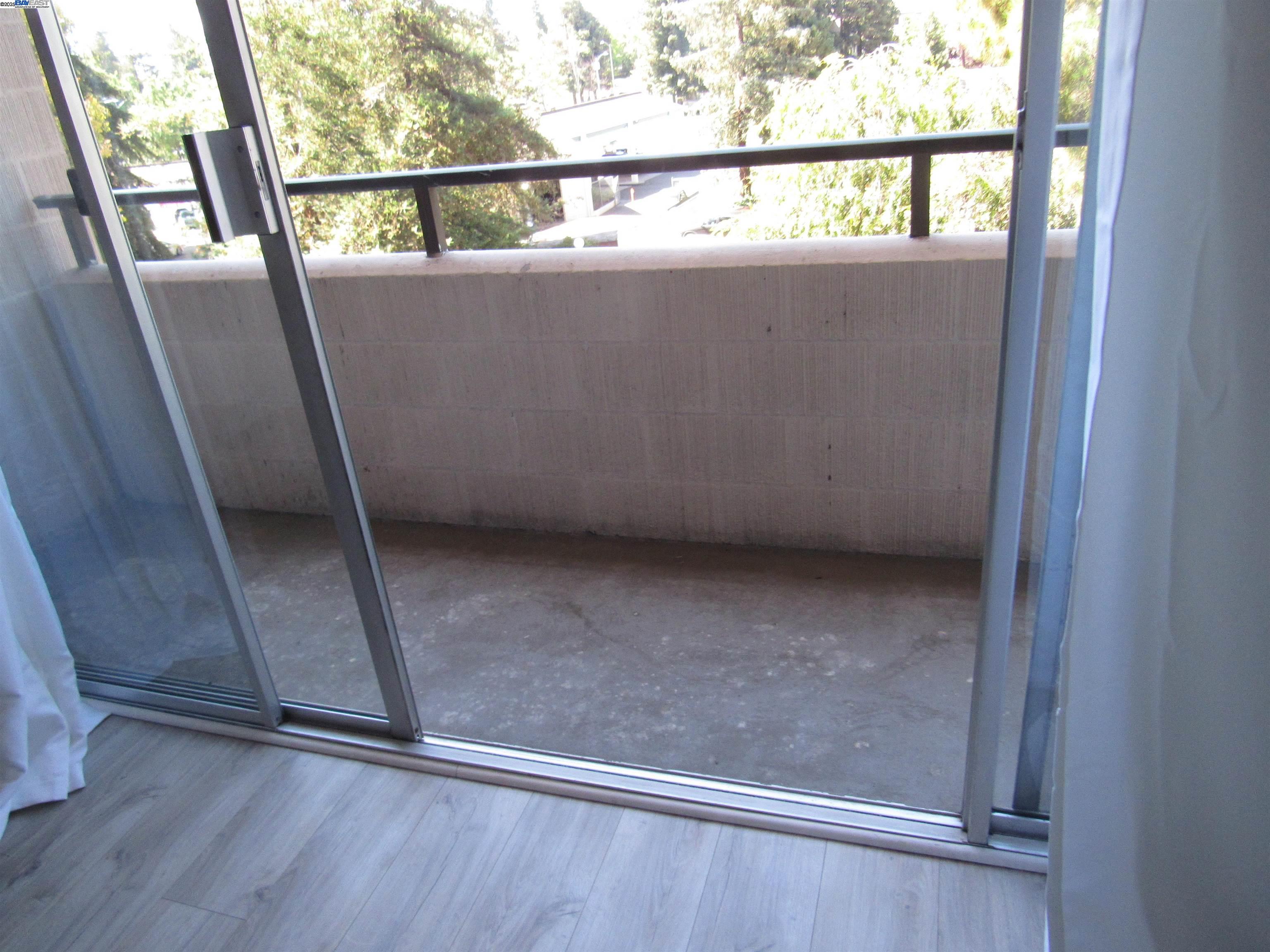 3909 Stevenson Boulevard, Unit 402 Fremont, CA 94538 - Photo 18 of 32 a view of outdoor space with sliding door