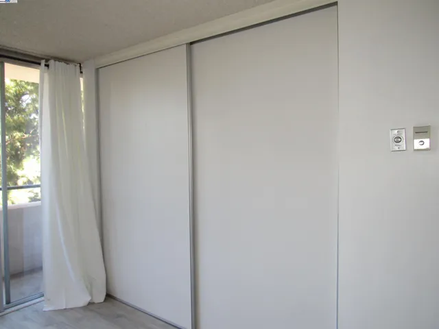 a view of a bathroom with wooden floor