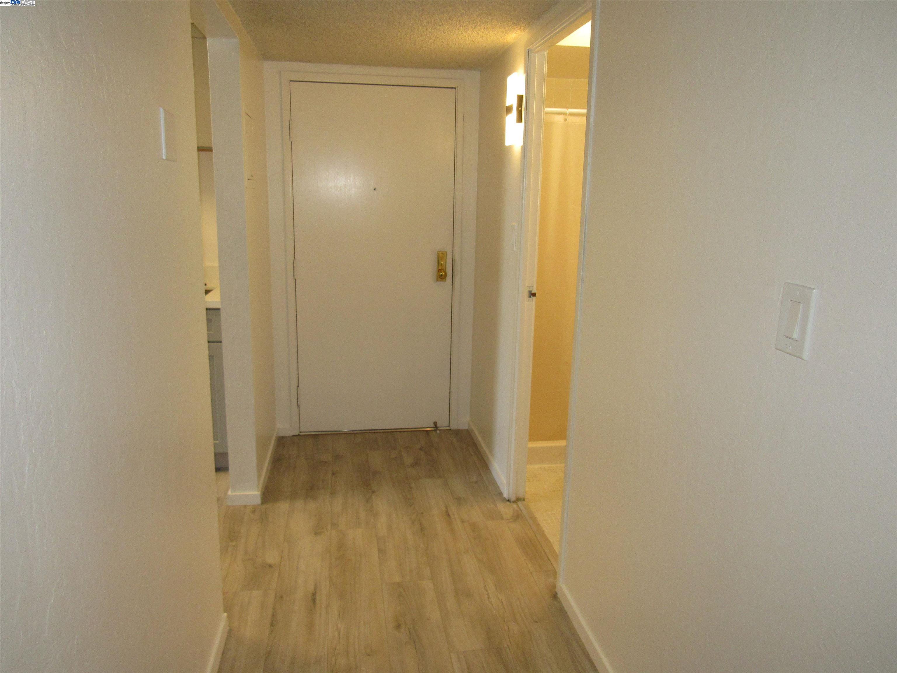 3909 Stevenson Boulevard, Unit 402 Fremont, CA 94538 - Photo 27 of 32 a view of a bathroom with wooden floor