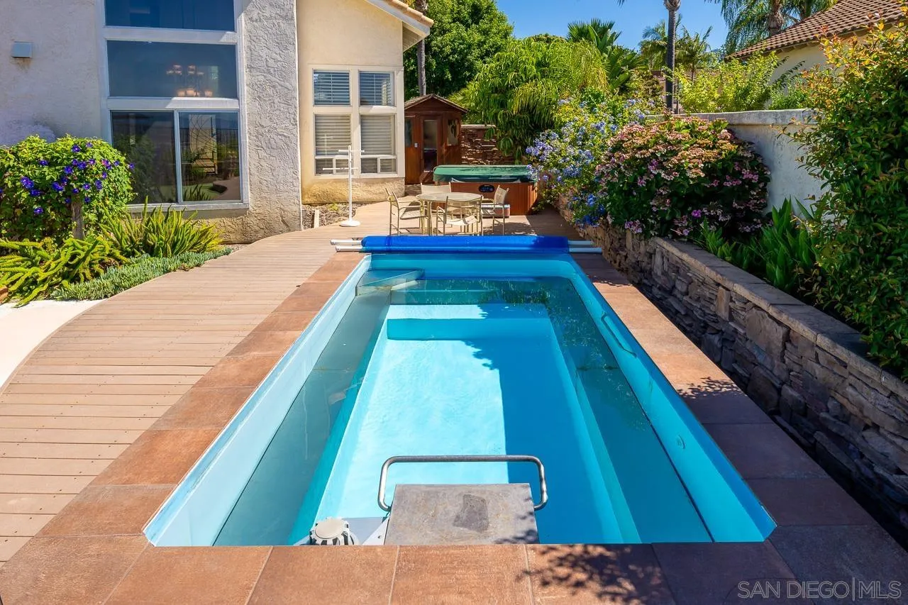 5114 Bella Collina Street Oceanside, CA 92056 - Photo 51 of 74 a view of swimming pool with a lounge chair
