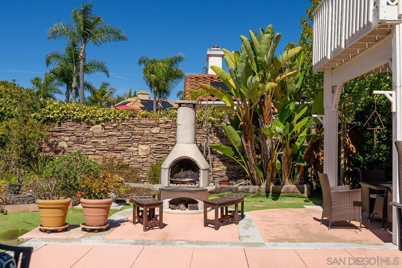 5114 Bella Collina Street Oceanside, CA 92056 - Photo 57 of 74 a view of a backyard with sitting area