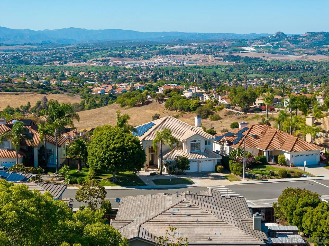 5114 Bella Collina Street Oceanside, CA 92056 - Photo 70 of 74 an aerial view of residential houses with outdoor space