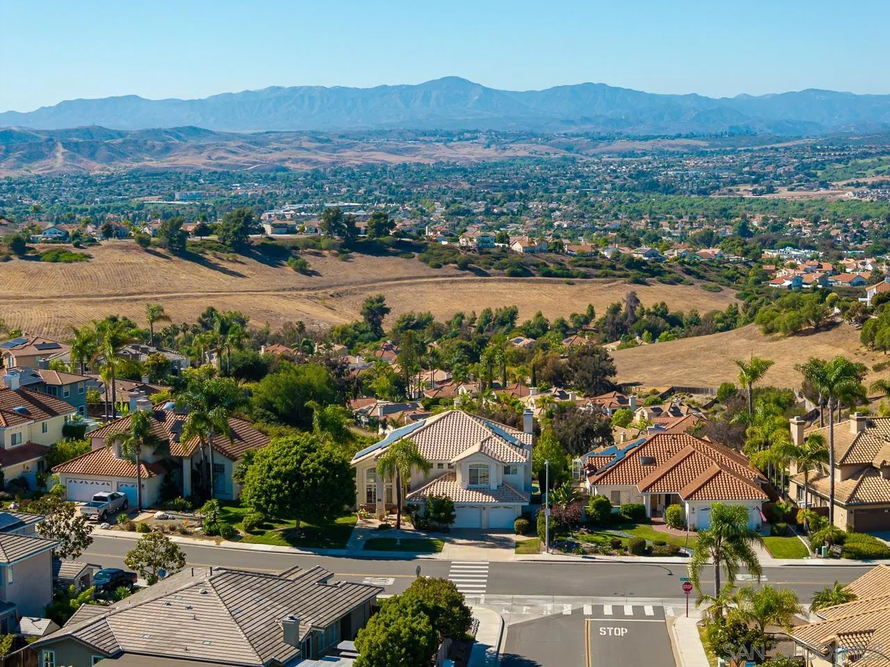 5114 Bella Collina Street Oceanside, CA 92056 - Photo 71 of 74 an aerial view of residential houses and lake view
