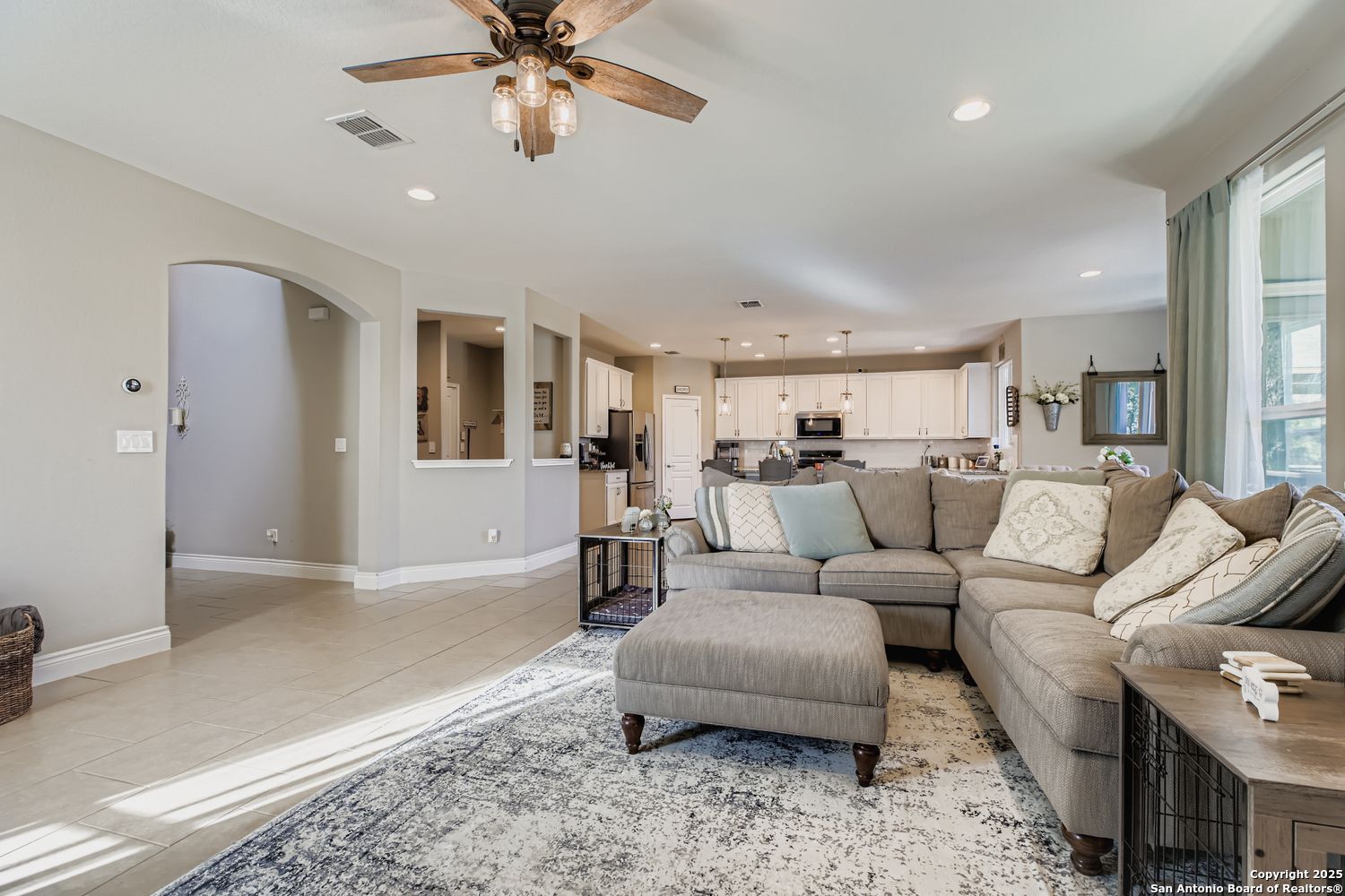 10639 Hibiscus Cove Helotes, TX 78023 - Photo 7 of 34 a living room with furniture and a rug