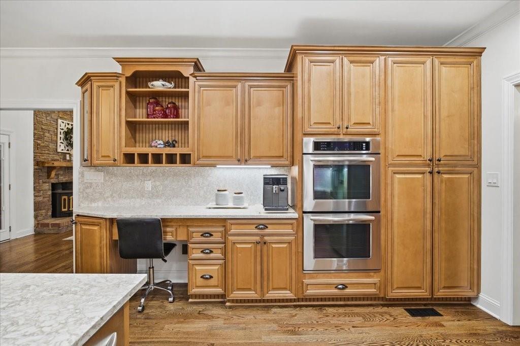 397 Thomas Road Dallas, GA 30132 - Photo 28 of 108 a kitchen with stainless steel appliances granite countertop a stove and a microwave