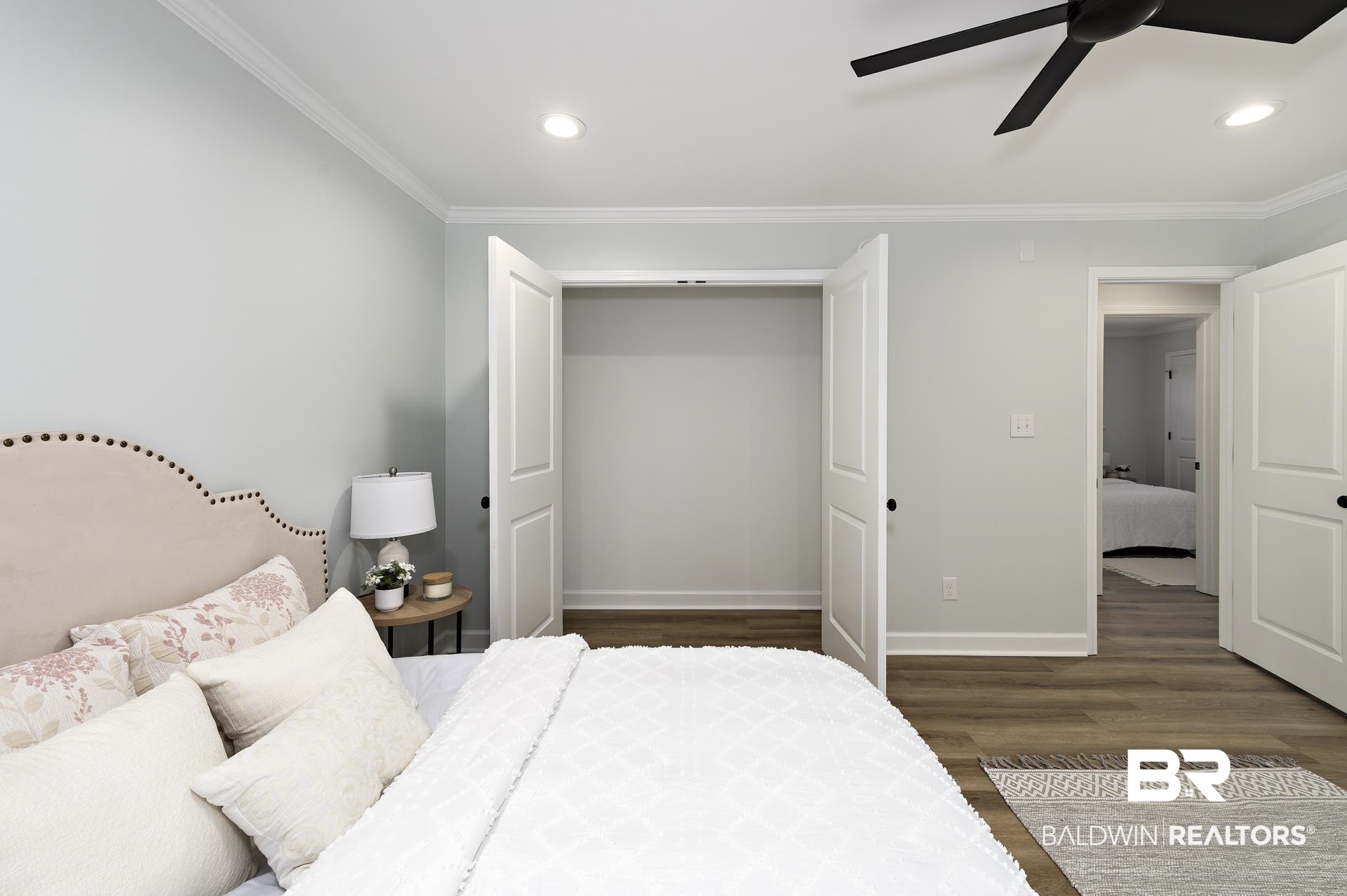 6001 Camp Halls Mill Road Mobile, AL 36619 - Photo 32 of 52 Bedroom with wood finished floors, a closet, ornamental molding, recessed lighting, and ceiling fan