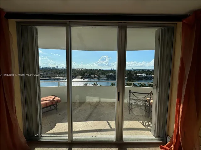 a living room with a couch and a flat screen tv