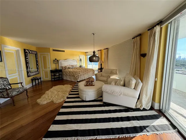 a bathroom with a shower and a sink