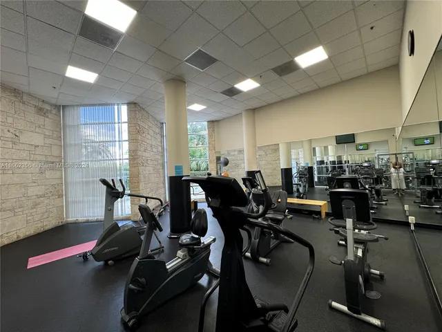 a view of yard with outdoor seating and plants