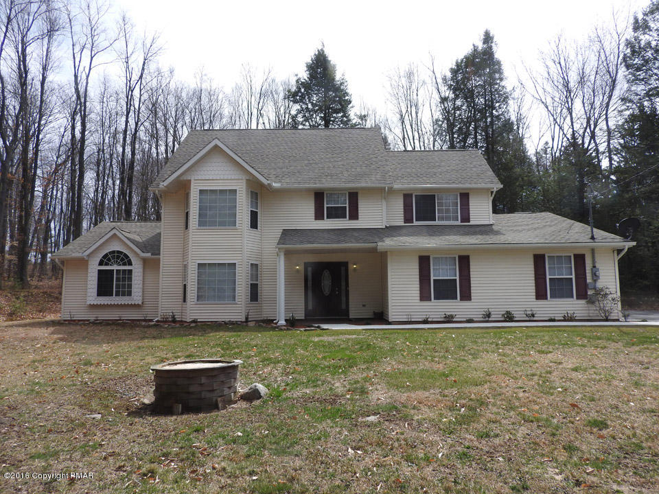 137 Lidio Road Blakeslee, PA 18610 - Photo 2 of 28 a front view of a house with a yard