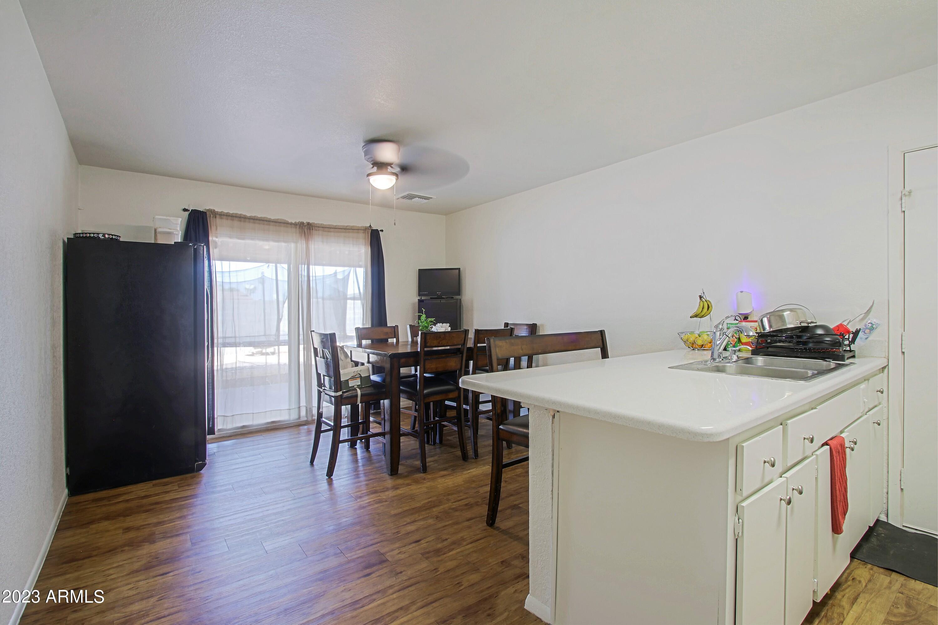1734 West Fremont Rd. Phoenix, AZ 85041 - Photo 9 of 33 Eating Area and Kitchen 1